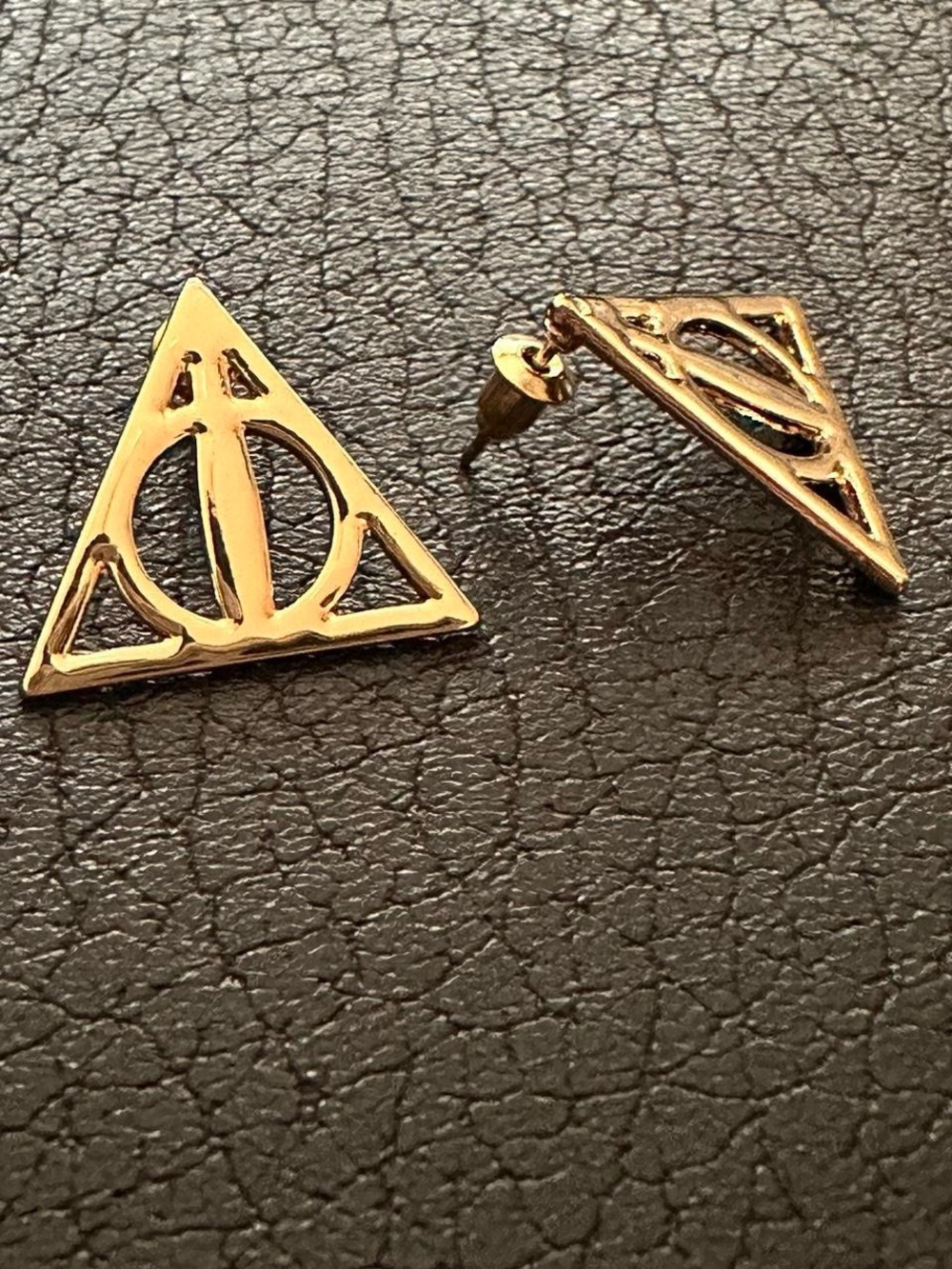 Harry potter deathly hallows earrings.